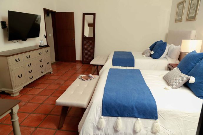 Imagen de la habitación del Hotel Casa Angeles. Foto 12