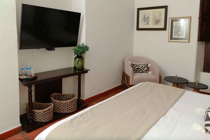Imagen de la habitación del Hotel Casa Angeles. Foto 17