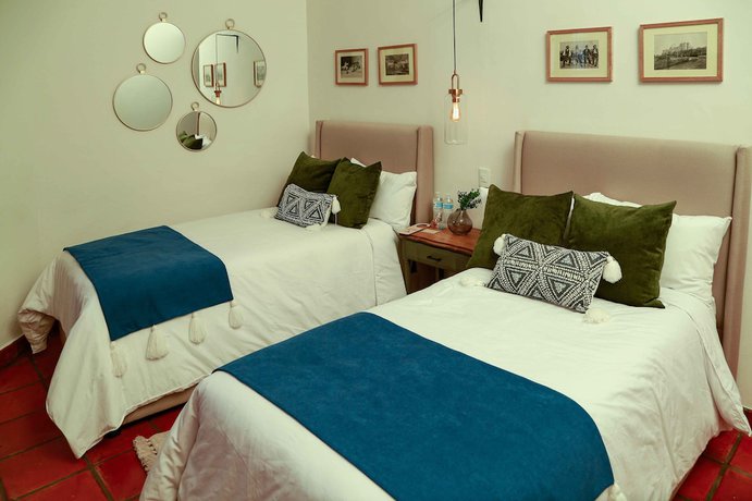 Imagen de la habitación del Hotel Casa Angeles. Foto 18