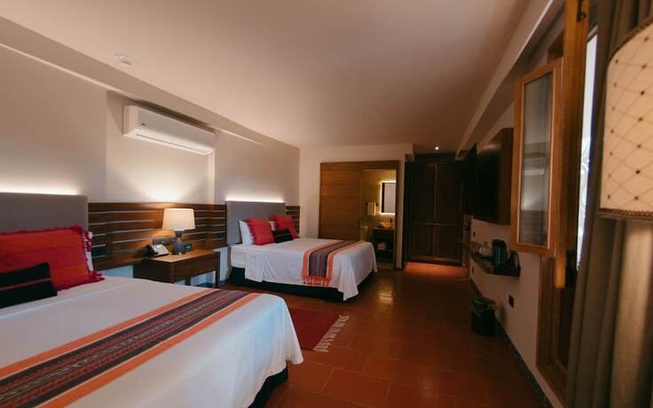 Imagen de la habitación del Hotel Casa Azulai Puebla Boutique. Foto 17
