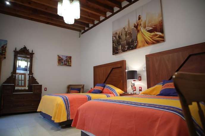 Imagen de la habitación del Hotel Casa Baez. Foto 13