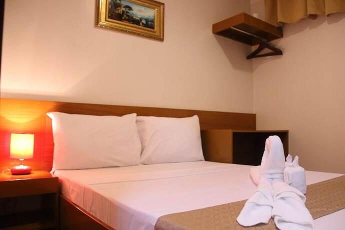 Imagen de la habitación del Hotel Casa Belina Tourist Inn. Foto 11