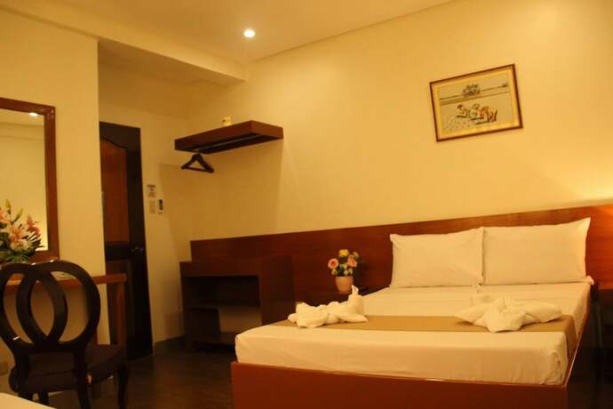 Imagen de la habitación del Hotel Casa Belina Tourist Inn. Foto 12