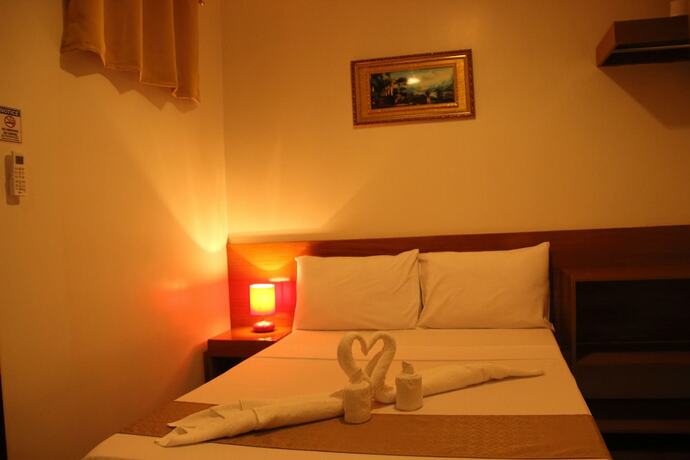 Imagen de la habitación del Hotel Casa Belina Tourist Inn. Foto 13