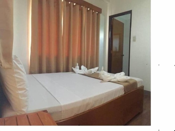 Imagen de la habitación del Hotel Casa Belina Tourist Inn. Foto 16