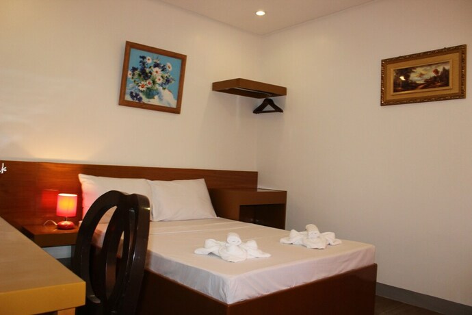 Imagen de la habitación del Hotel Casa Belina Tourist Inn. Foto 17