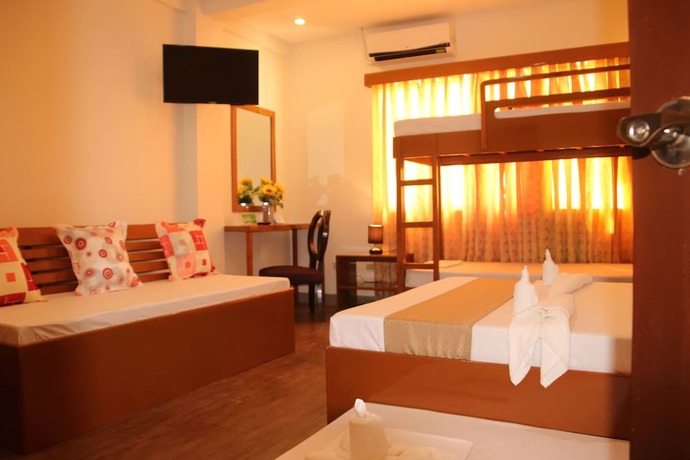 Imagen de la habitación del Hotel Casa Belina Tourist Inn. Foto 19