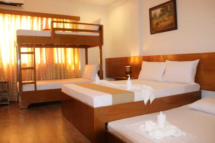 Imagen de la habitación del Hotel Casa Belina Tourist Inn. Foto 22