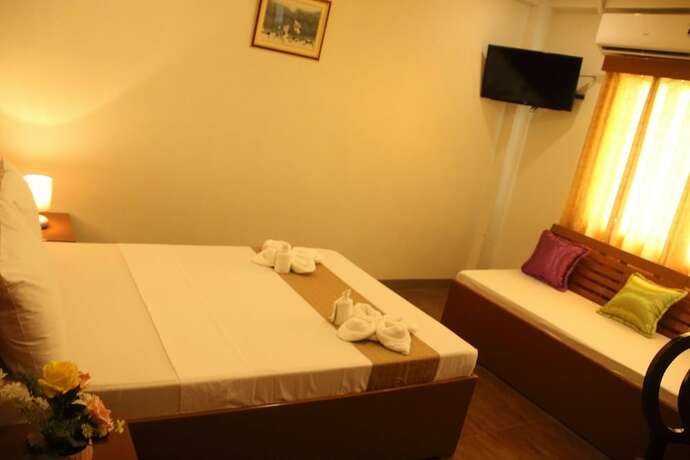 Imagen de la habitación del Hotel Casa Belina Tourist Inn. Foto 23