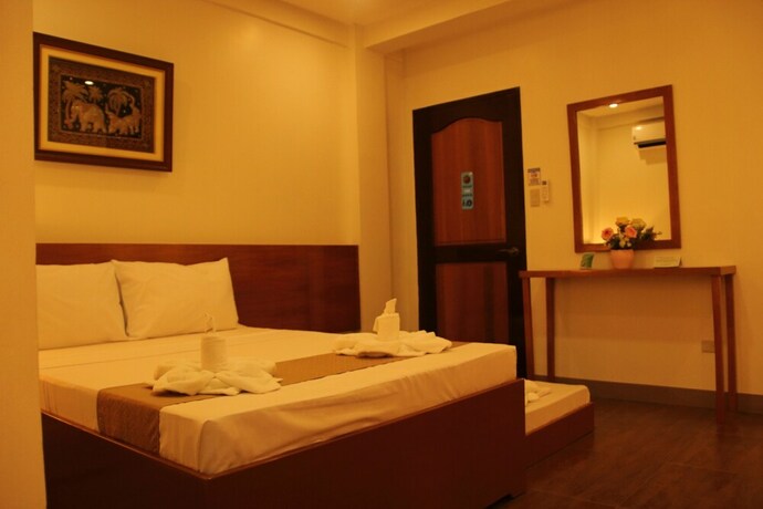 Imagen de la habitación del Hotel Casa Belina Tourist Inn. Foto 25