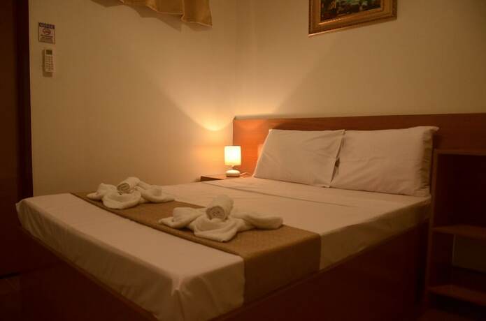 Imagen de la habitación del Hotel Casa Belina Tourist Inn. Foto 26