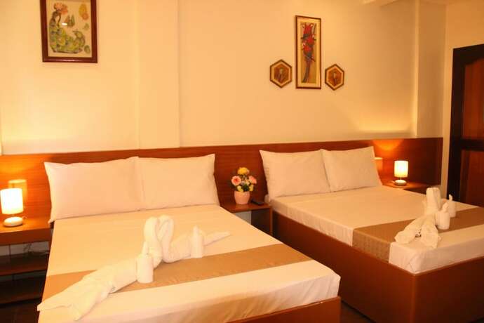 Imagen de la habitación del Hotel Casa Belina Tourist Inn. Foto 29
