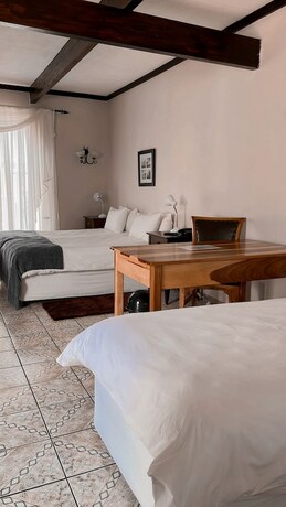 Imagen de la habitación del Hotel Casa Blanca Boutique Pension. Foto 16