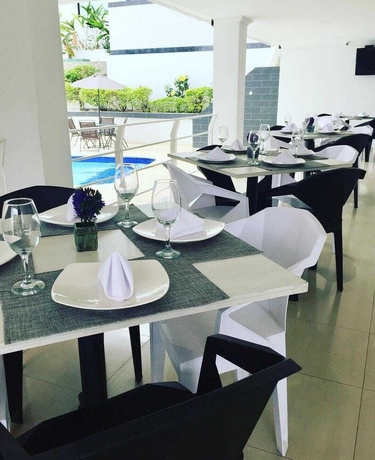 Imagen del bar/restaurante del Hotel Casa Blanca Villeta. Foto 9