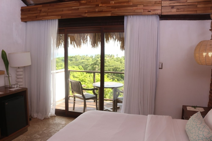 Imagen de la habitación del Hotel Casa Bonita Tropical Lodge. Foto 13
