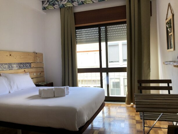 Imagen de la habitación del Hotel Casa Bonjardim. Foto 19