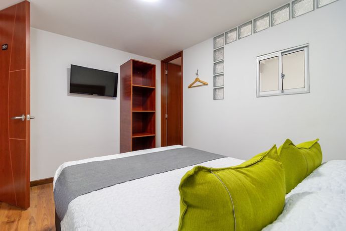 Imagen de la habitación del Hotel Casa Botero. Foto 13