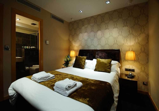 Imagen de la habitación del Hotel Casa Boutique Barcelona. Foto 3