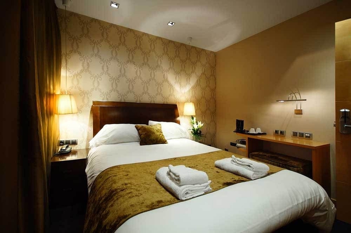 Imagen de la habitación del Hotel Casa Boutique Barcelona. Foto 5