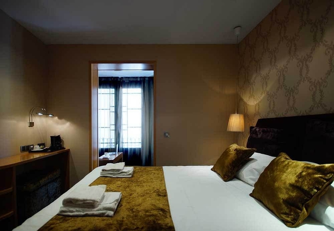 Imagen de la habitación del Hotel Casa Boutique Barcelona. Foto 9