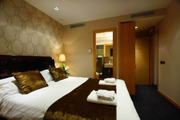 Imagen de la habitación del Hotel Casa Boutique Barcelona. Foto 10