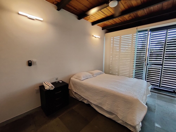 Imagen de la habitación del Hotel Casa Boutique Ilhe Ha. Foto 11