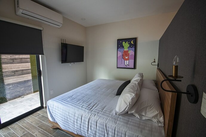 Imagen de la habitación del Hotel Casa Bruna Luxury Lofts. Foto 15