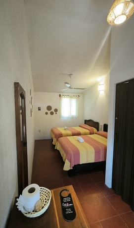 Imagen de la habitación del Hotel Casa Bugambilias, San Pedro Pochutla. Foto 4