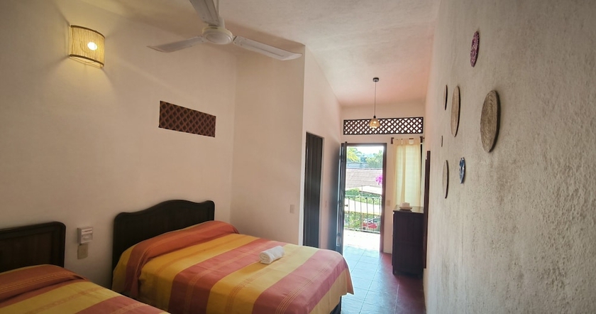 Imagen de la habitación del Hotel Casa Bugambilias, San Pedro Pochutla. Foto 12