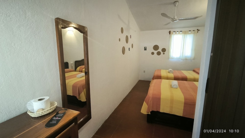 Imagen de la habitación del Hotel Casa Bugambilias, San Pedro Pochutla. Foto 13