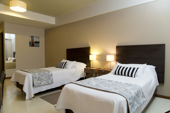 Imagen de la habitación del Hotel Casa Campus Pilar Suites. Foto 11