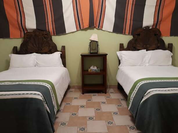 Imagen de la habitación del Hotel Casa Cinco De Mayo. Foto 13