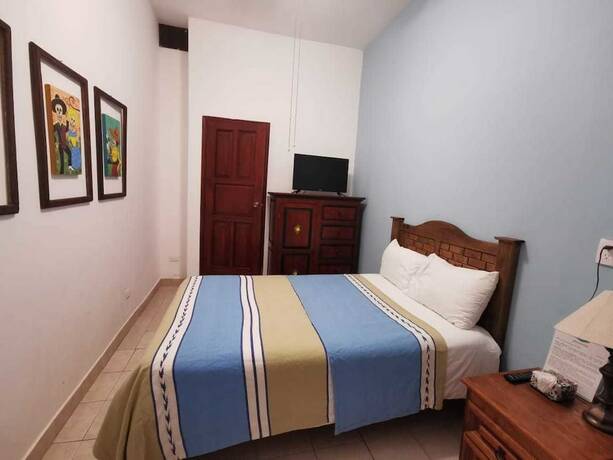 Imagen de la habitación del Hotel Casa Cinco De Mayo. Foto 14