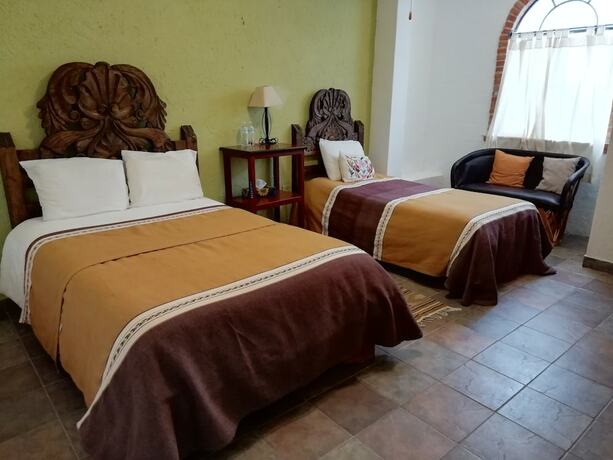 Imagen de la habitación del Hotel Casa Cinco De Mayo. Foto 15