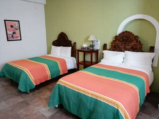 Imagen de la habitación del Hotel Casa Cinco De Mayo. Foto 16