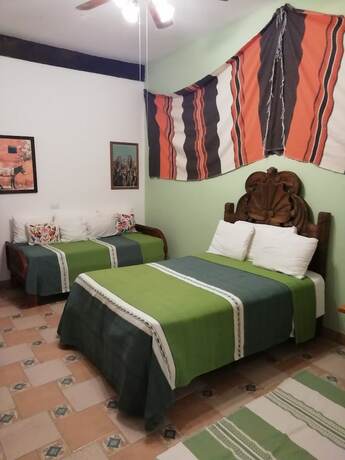 Imagen de la habitación del Hotel Casa Cinco De Mayo. Foto 18