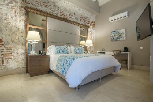 Imagen de la habitación del Hotel Casa Cochera Del Gobernador. Foto 7