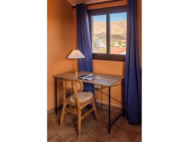 Imagen de la habitación del Hotel Casa Cocolores. Foto 11