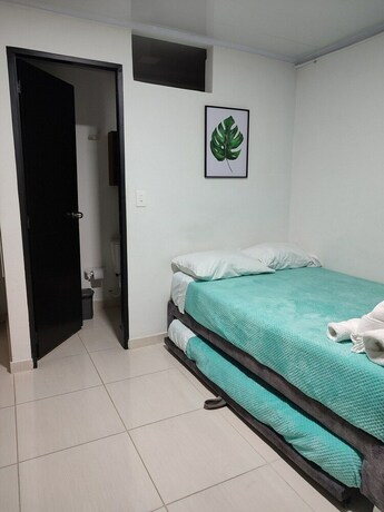 Imagen de la habitación del Hotel Casa Confort. Foto 12