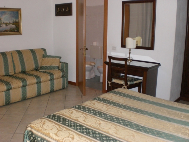 Imagen de la habitación del Hotel Casa Cosmo Lodging House. Foto 5