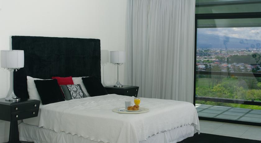 Imagen de la habitación del Hotel Casa Cristal Boutique. Foto 7