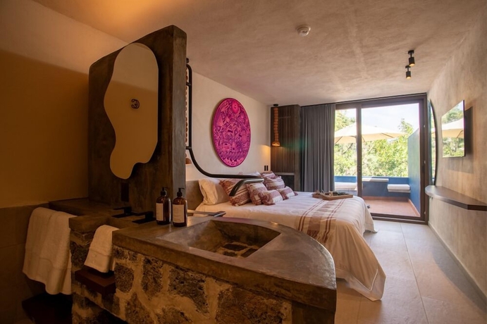 Imagen de la habitación del Hotel Casa Cristina Fresh Boutique. Foto 8