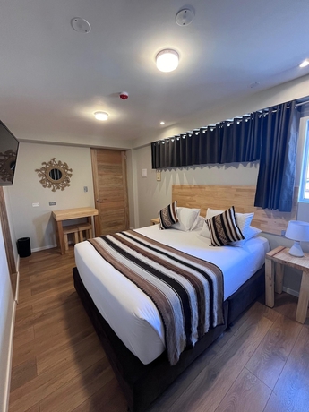 Imagen de la habitación del Hotel Casa Cristobal Centenario. Foto 5