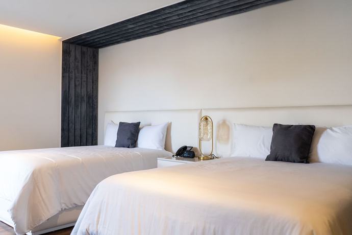 Imagen de la habitación del Hotel Casa Cuarzo Boutique. Foto 4