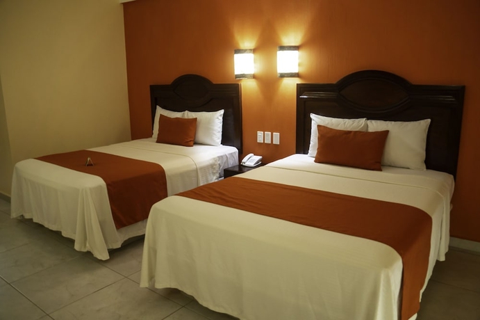 Imagen de la habitación del Hotel Casa Danna Huatulco. Foto 12