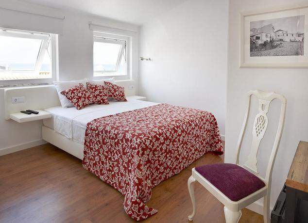 Imagen de la habitación del Hotel Casa Das Aguarelas. Foto 11