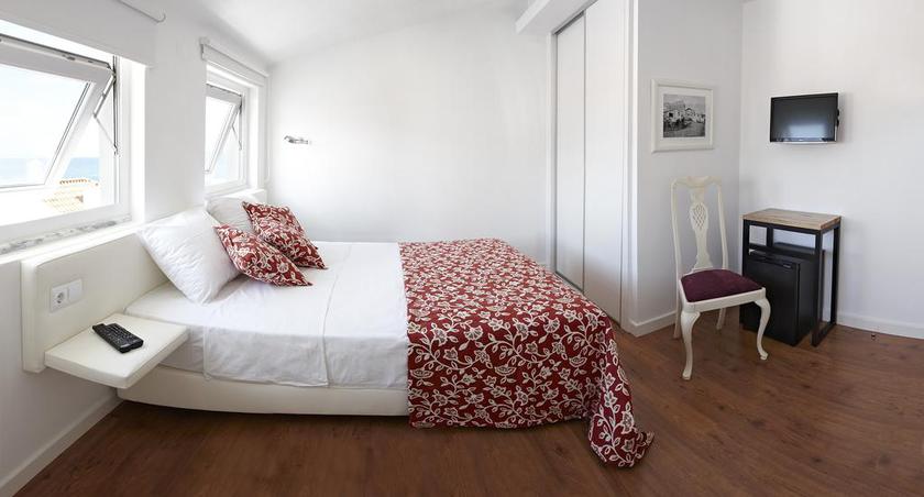 Imagen de la habitación del Hotel Casa Das Aguarelas. Foto 12