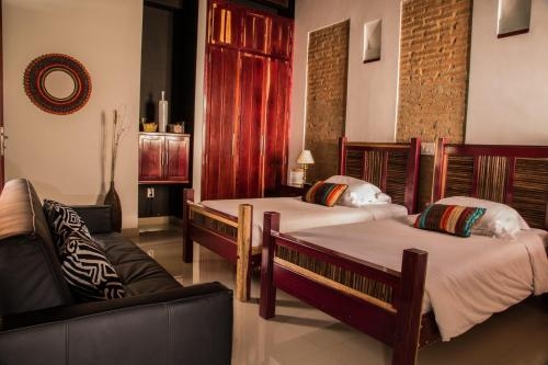 Imagen de la habitación del Hotel Casa De Isabella, A Kali. Foto 6