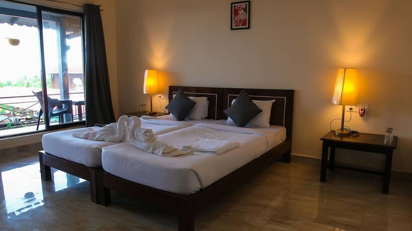 Imagen de la habitación del Hotel Casa De Lamore Sea View Resort. Foto 20