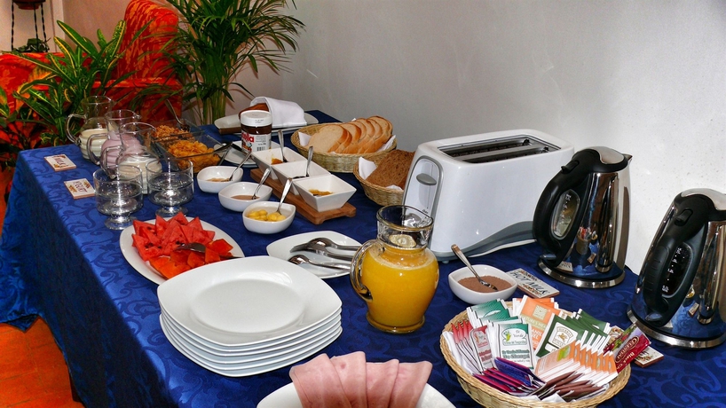 Imagen del bar/restaurante del Hotel Casa De Las Rosas. Foto 3